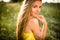 Portrait of young woman with radiant clean outdoor on a sunny day