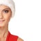 Portrait of a young woman in a Santa winter hat