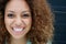 Portrait of a young woman smiling with happy expression on face