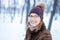 Portrait of young woman during walk at winter