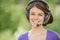 Portrait of young woman wearing headphones