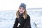 Portrait of a young woman in winter season beach