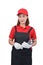 Portrait of young woman worker smiling in red uniform with apron, glove hand holding Shoveling fork isolated on white backround