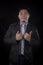 Portrait of younger asian business man good working hand sign wi