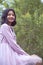 Portraits smiling Asian young girl with pine tree in vintage color