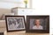 Portraits in stylish frames on table