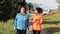 Portraits of talking grandmother and her adult granddaughter walking on the street. Outdoor. International Day of Older