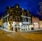 Portree, Isle of Skye , Scotland - October 25 2019 : The main street in Portree is enlightened during the night