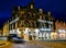 Portree, Isle of Skye , Scotland - October 25 2019 : The main street in Portree is enlightened during the night