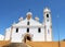 Portugal. Algarve. Portimao. White catholic church on blue sky background. Horizontal view.