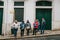 Portugal, Lisbon, April 10, 2018: People at the bus stop waiting for transport. Ordinary city life