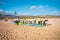 Portugal, Sintra, August 2022 Praia da Guincho Group of surfboard students training to ride waves