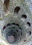 Portugal, Sintra, Quinta da Regaleira, Initiation Well (Poco Iniciatico), stone gallery with stairs