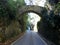 Portugal, Sintra, R. Barbosa du Bocage, stone arch crossing over the road