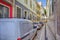 Portugal Travel Ideas. Traveling Through the Colorful Streets of Lisbon With Line of Cars At Summer