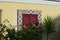 Portugal window. Costa de Caparica Almada. Authentic. Yellow wall. Palm. Janela de Portugal. Parede amarelo. Light and shadow.