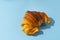 Portuguese Brioche Croissants on blue background