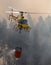 Portuguese CS-HMI Civil Protection Firefighter Helicopter Dropping Water on a Fire.