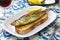 Portuguese grilled sardine on toasted bread