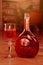 Portuguese rose semi-dry wine MATEUS ROSE. bottle and glass of wine in the room interior