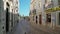 Portuguese streets in the southern town of Tavira, with historic traditional houses. Shooting with a stabilizer.