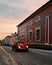 Porvoo, Finland - December 25, 2018: red vintage VW Beatle on the streets of Old historic Porvoo at blue hour sunrise