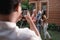 Pose photo of three islam women standing on the backyard while look at camera