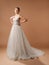 Posh wedding dress. Fashionable bridal gown with tender french lace and beads, long train, tulle skirt. Contemporary design. Beaut