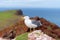 Posing seagull with Ponta de Sao Lourenco peninsula in background, Madeira island, Portugal