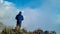 Positano - Hiking man with scenic view from Monte Comune on thick clouds near Positano at the Amalfi Coast, Campania, Italy.