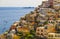 Positano houses with sea, Li galli isles and boats in background