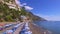 Positano, Italy - Beach with umbrellas, Amalfi coast, vacation concept aerial