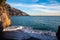 Positano - Scenic view at the Fornillo Beach in the coastal town Positano at Amalfi Coast, Italy. Praiano in distance
