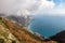 Positano - Scenic view from hiking trail on clouds covering the coastal town Positano at the Amalfi Coast, Campania, Italy.