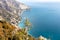 Positano - Scenic view from hiking trail on clouds covering the coastal town Positano at the Amalfi Coast, Campania, Italy.