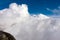 Positano - Scenic view from Monte Comune on thick clouds covering the coastal town Positano at the Amalfi Coast, Campania, Italy.