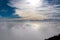 Positano - Scenic view from Monte Comune on thick clouds covering the coastal town Positano at the Amalfi Coast, Campania, Italy.