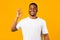 Positive African Man Gesturing OK Sign On Yellow Studio Background