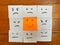 Positive attitude concept - Happy smiling face among unhappy, sad, angry and emotional face drawings.