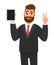 Positive bearded young business man showing/holding blank screen of tablet computer display and gesturing/making victory, v, peace