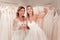 Positive beautiful brides posing for a photo