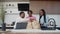 Positive black family unpacking shopping bags with groceries