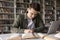 Positive busy hardworking student guy writing draft, notes