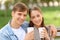 Positive couple drinking coffee