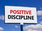 Positive discipline symbol. Concept words Positive discipline on beautiful big white billboard. Beautiful blue sky cloud