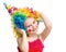 Positive girl poses in clown wig isolated on white background