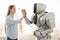 Positive girl and robot giving high five