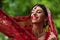 positive indian bride in red sari