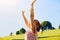 Positive little girl having fun in summer day