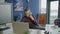 Positive manager talking phone in office closeup. Businessman reading laptop